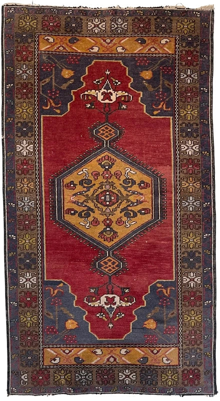 Vintage hand-knotted Anatolian rug 185x100 cm – tribal wool runner — photograph 1