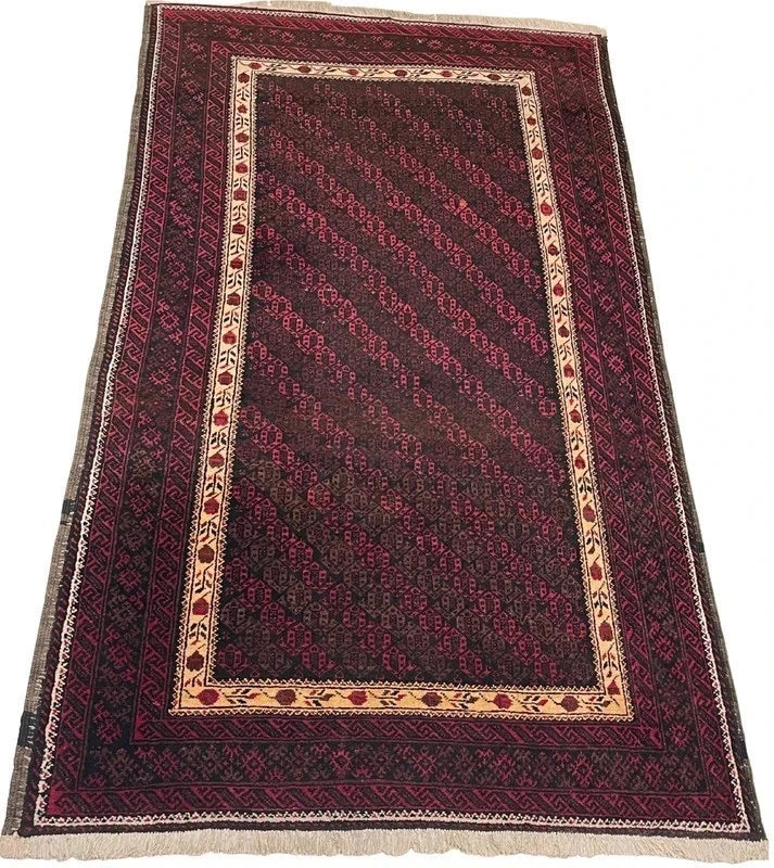 Handmade wool rug – Afghan/Baluch style – 180 × 102 cm – burgundy/black & ivory border — photograph 1