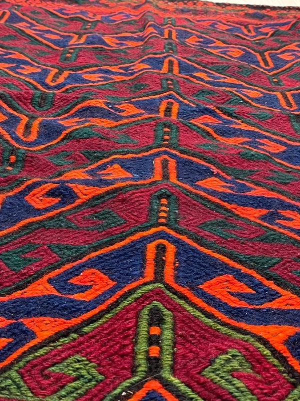 Handwoven kilim / soumak style rug – bold chevron – 155 × 133 cm – orange/blue/green — photograph 5