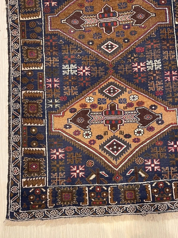 Hand-knotted tribal rug – navy & sand medallions – 197 × 108 cm — photograph 5