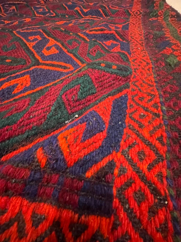 Handwoven kilim / soumak style rug – bold chevron – 155 × 133 cm – orange/blue/green — photograph 3