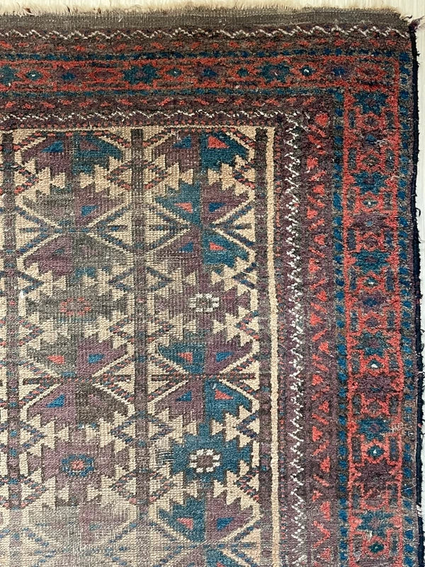 Antique hand-knotted tribal rug 150 x 83 cm worn Baluch style rug — photograph 6