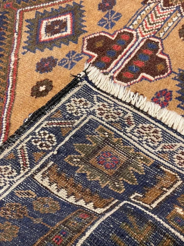 Hand-knotted tribal rug – navy & sand medallions – 197 × 108 cm — photograph 10