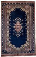 Vintage navy oriental rug 154×96cm – floral medallion, fringed — photograph 1