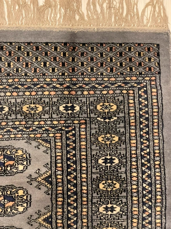 Hand knotted Bokhara style wool rug 130 x 187 cm grey vintage rug — photograph 15