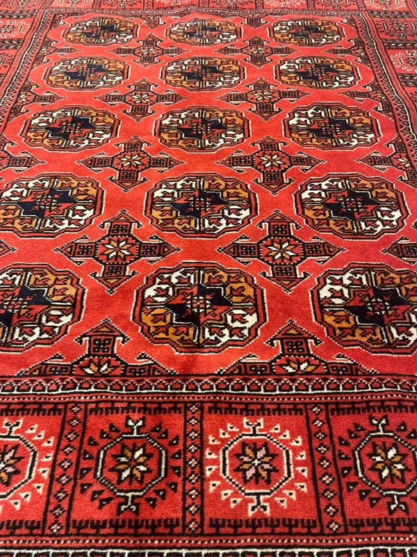 Vintage Hand-Knotted Pakistani Bokhara Rug 147 × 104 cm Red Wool — photograph 1