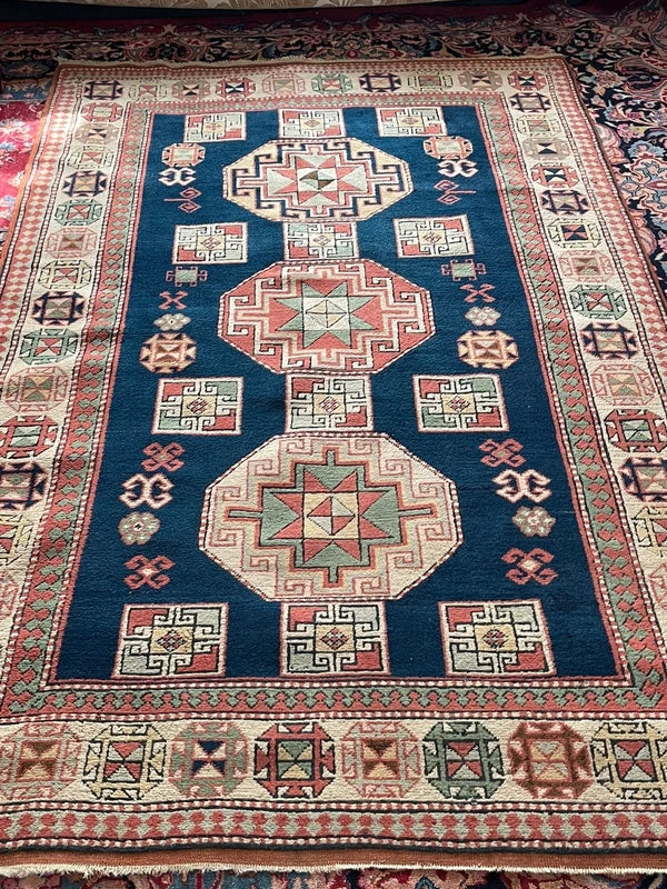 Vintage geometric wool rug, Turkish/Caucasian style 230 x 145 cm — photograph 7
