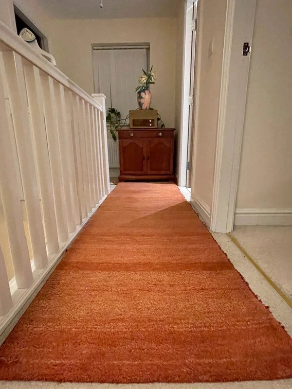 Hand‑knotted 100% wool runner 8ft (244x81cm) terracotta/rust — photograph 1