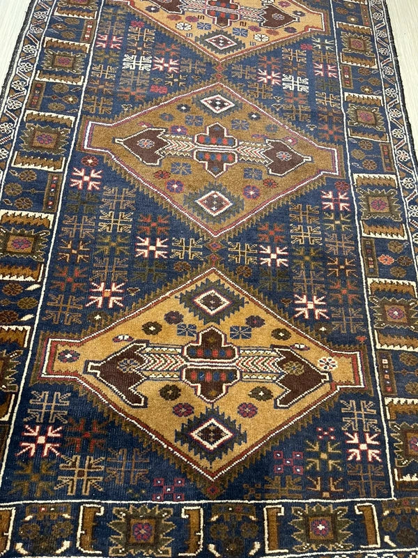 Hand-knotted tribal rug – navy & sand medallions – 197 × 108 cm — photograph 11
