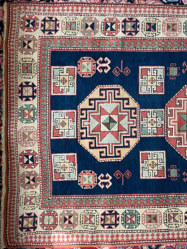 Vintage geometric wool rug, Turkish/Caucasian style 230 x 145 cm — photograph 9