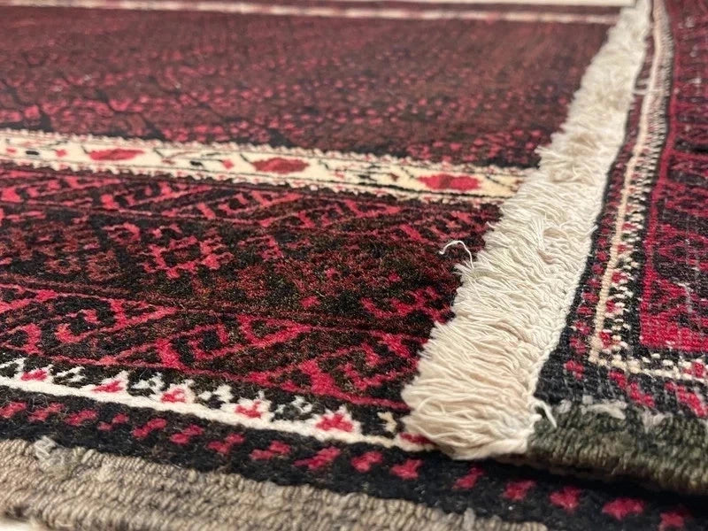 Handmade wool rug – Afghan/Baluch style – 180 × 102 cm – burgundy/black & ivory border — photograph 10