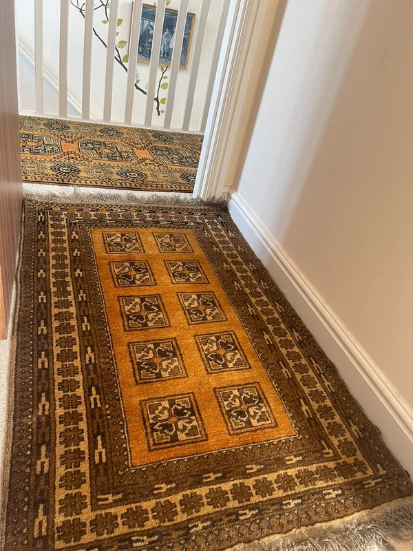 Small handmade Bokhara rug, approx. 139 x 85 cm. — photograph 1