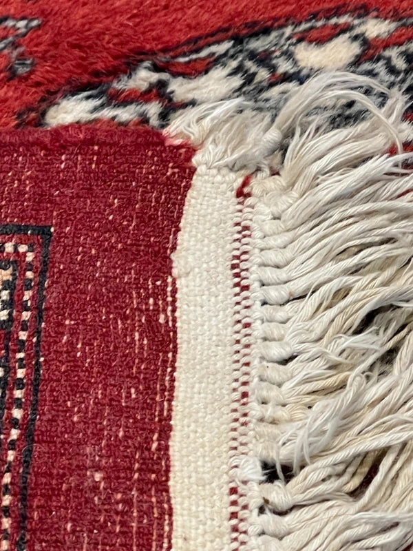 Hand knotted Red Bokhara / Turkoman style rug 186 x 130 cm – cream & navy motifs — photograph 8