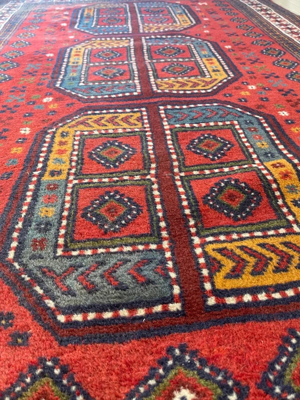 Vintage hand-knotted Afghan tribal rug 195x120 cm – red geometric wool carpet — photograph 5