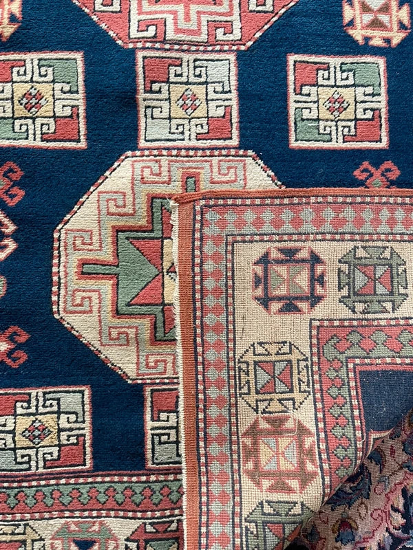 Vintage geometric wool rug, Turkish/Caucasian style 230 x 145 cm — photograph 15
