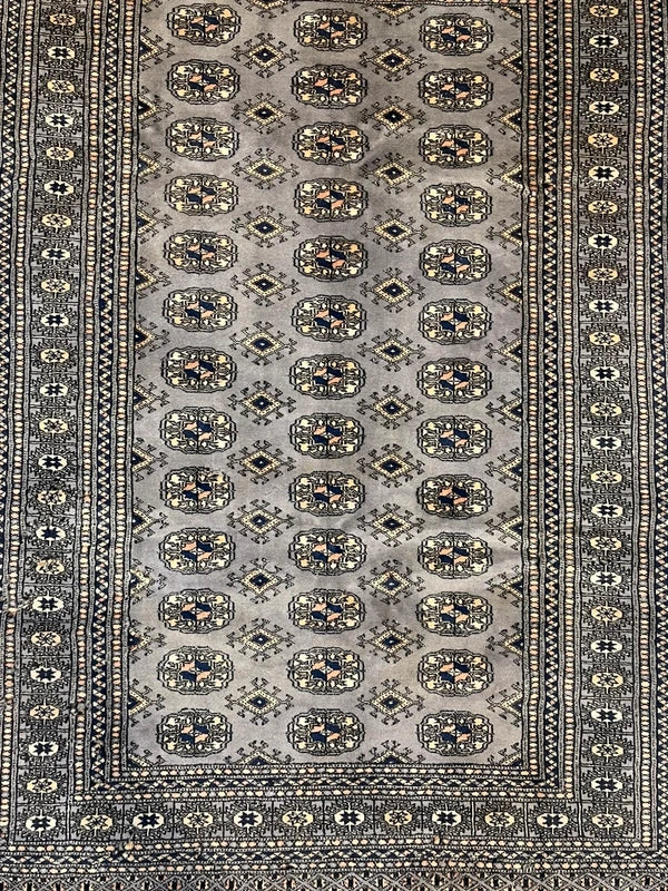 Hand knotted Bokhara style wool rug 130 x 187 cm grey vintage rug — photograph 4