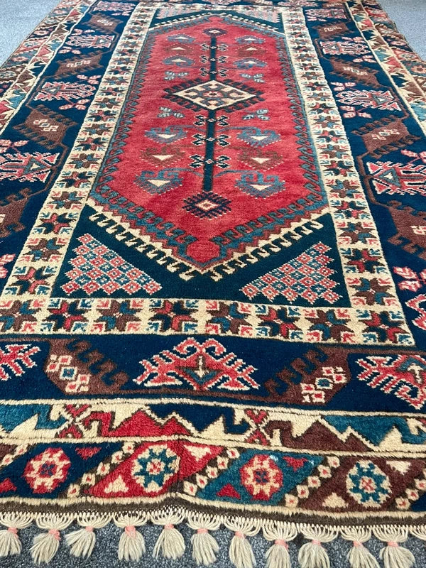 Vintage Hand Knotted Tribal Rug 246 x 141 cm Wool — photograph 6