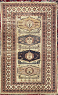 Hand-knotted wool rug with silk highlights – neutral geometric medallions – 184 × 122 cm — photograph 1