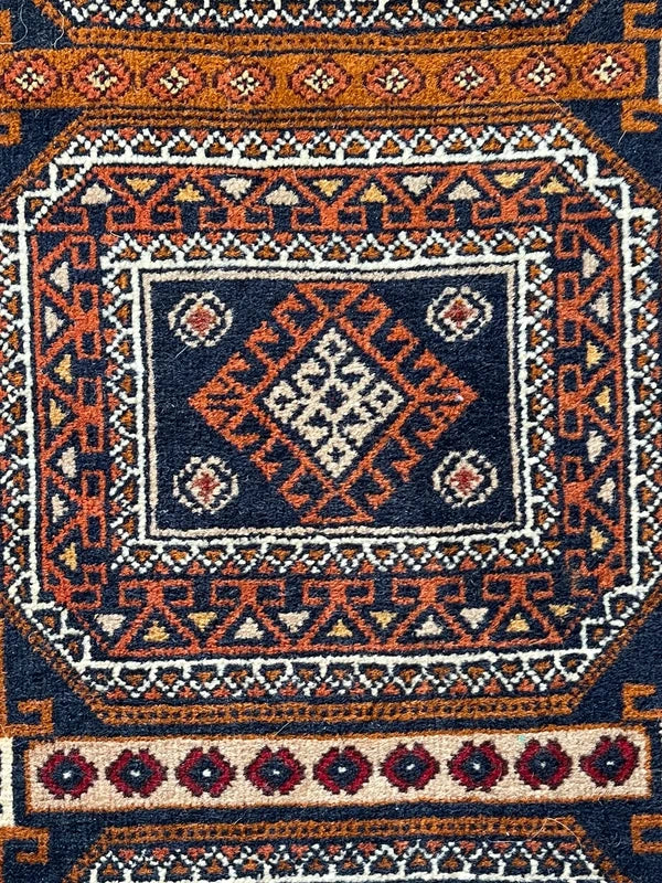 Vintage hand-knotted tribal rug 154 x 86 cm Afghan style geometric wool rug — photograph 3