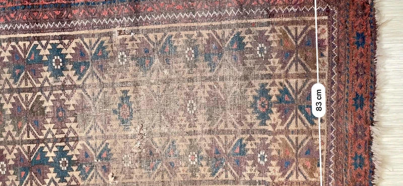 Antique hand-knotted tribal rug 150 x 83 cm worn Baluch style rug — photograph 14