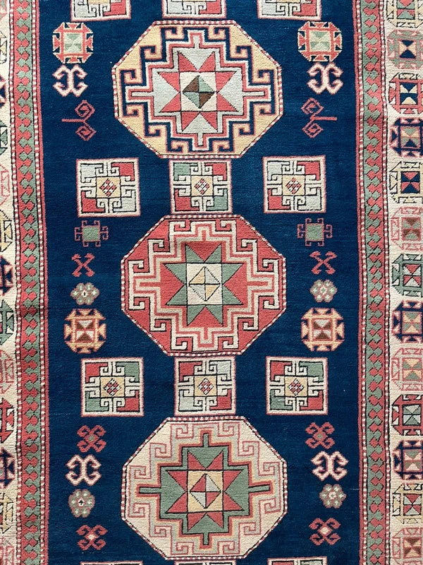 Vintage geometric wool rug, Turkish/Caucasian style 230 x 145 cm — photograph 1
