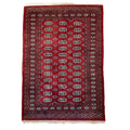 Hand knotted Red Bokhara / Turkoman style rug 186 x 130 cm – cream & navy motifs — photograph 1