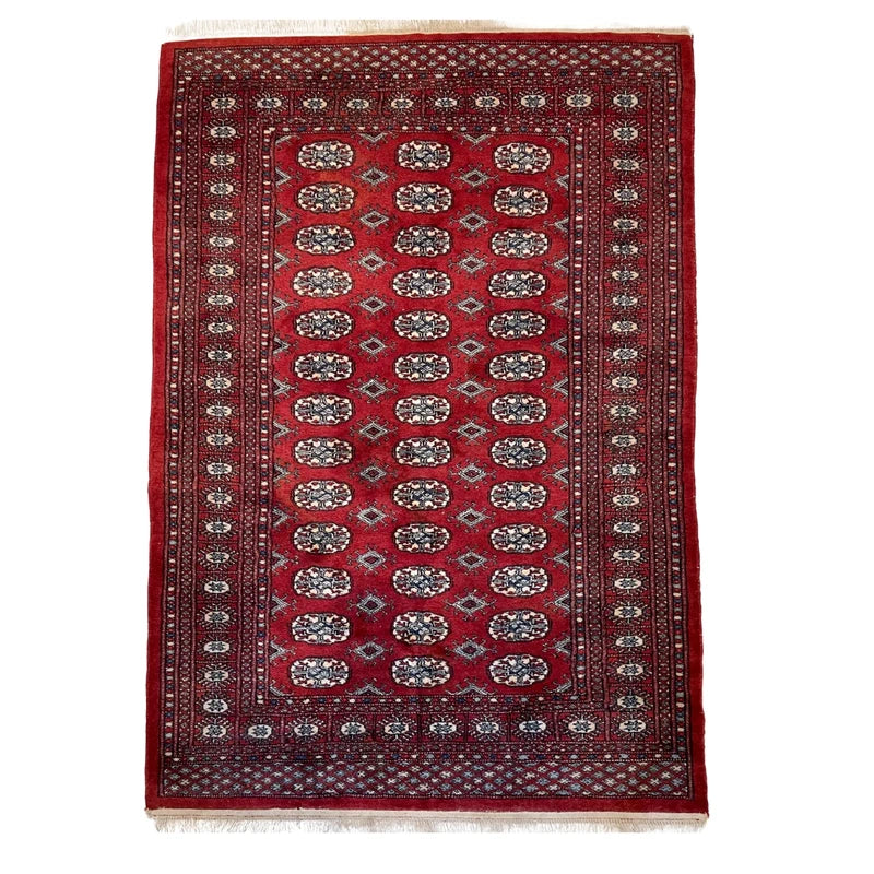Hand knotted Red Bokhara / Turkoman style rug 186 x 130 cm – cream & navy motifs — photograph 1