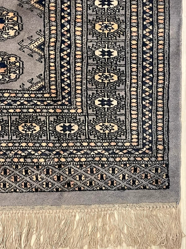 Hand knotted Bokhara style wool rug 130 x 187 cm grey vintage rug — photograph 5