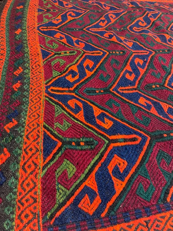 Handwoven kilim / soumak style rug – bold chevron – 155 × 133 cm – orange/blue/green — photograph 6