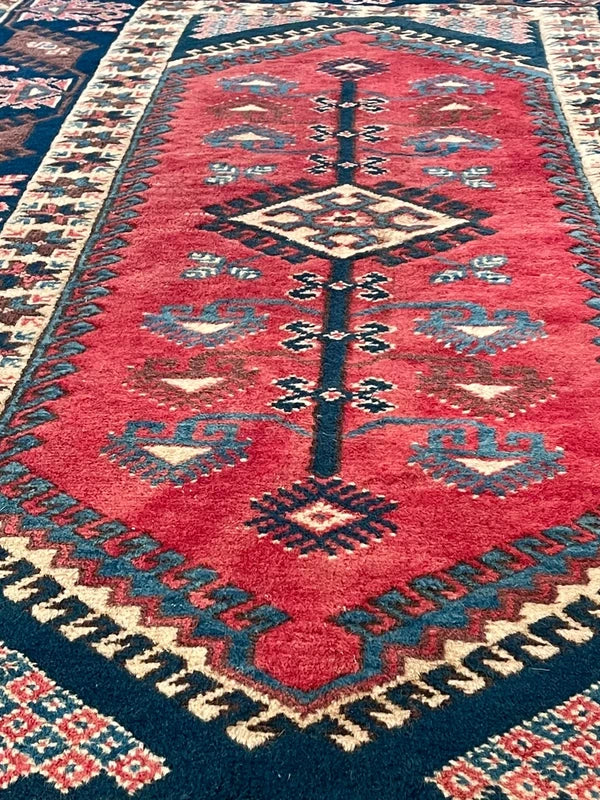 Vintage Hand Knotted Tribal Rug 246 x 141 cm Wool — photograph 1