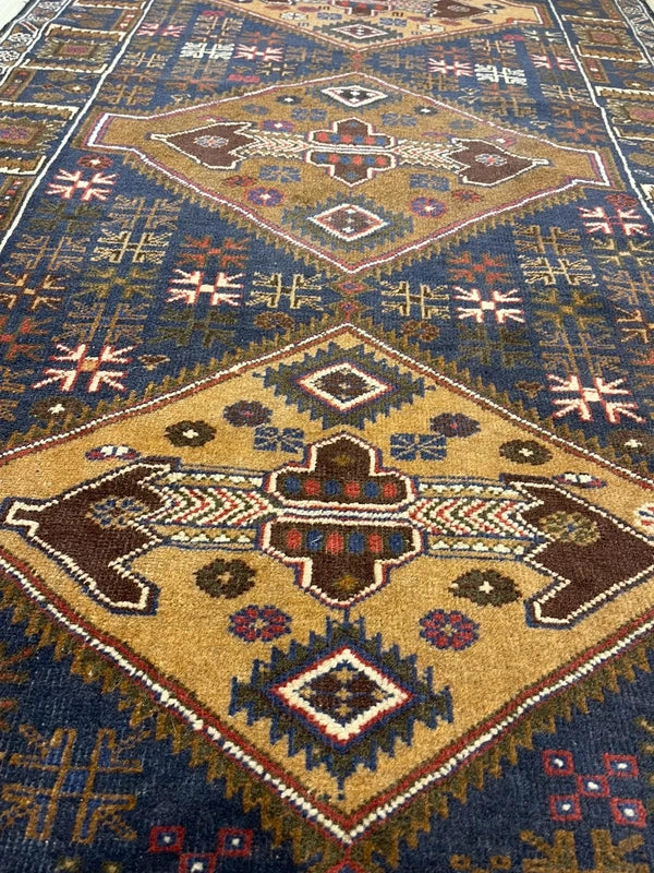 Hand-knotted tribal rug – navy & sand medallions – 197 × 108 cm — photograph 7