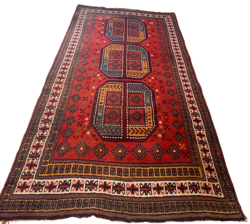 Vintage hand-knotted Afghan tribal rug 195x120 cm – red geometric wool carpet — photograph 2