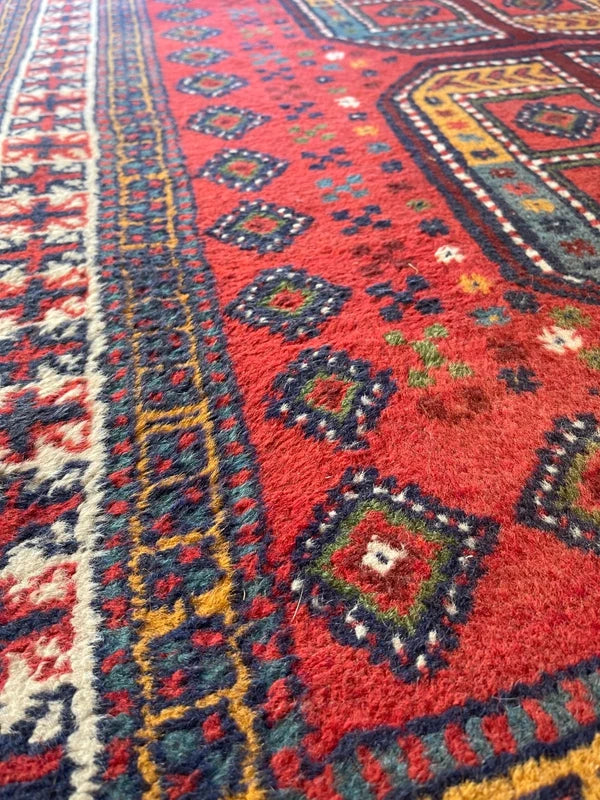 Vintage hand-knotted Afghan tribal rug 195x120 cm – red geometric wool carpet — photograph 4