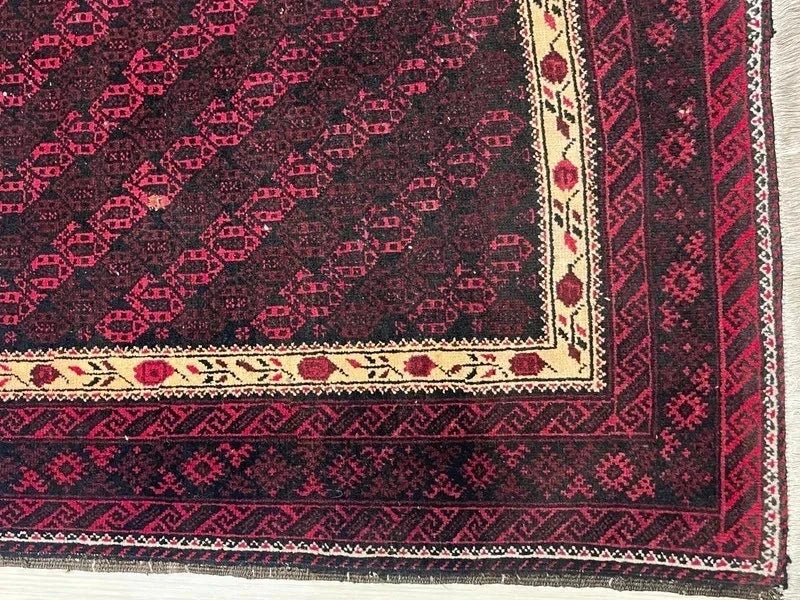 Handmade wool rug – Afghan/Baluch style – 180 × 102 cm – burgundy/black & ivory border — photograph 9