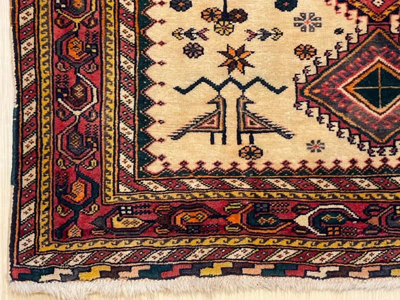 Hand-knotted wool tribal rug 148 x 100 cm – ivory & red geometric (Persian style) — photograph 9
