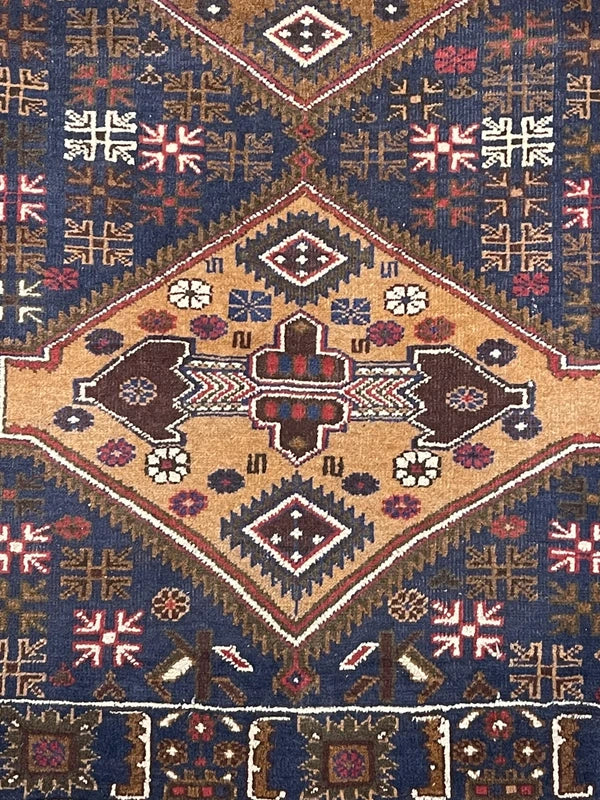 Hand-knotted tribal rug – navy & sand medallions – 197 × 108 cm — photograph 2