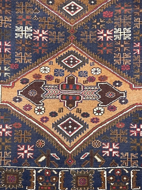 Hand-knotted tribal rug – navy & sand medallions – 197 × 108 cm — photograph 2